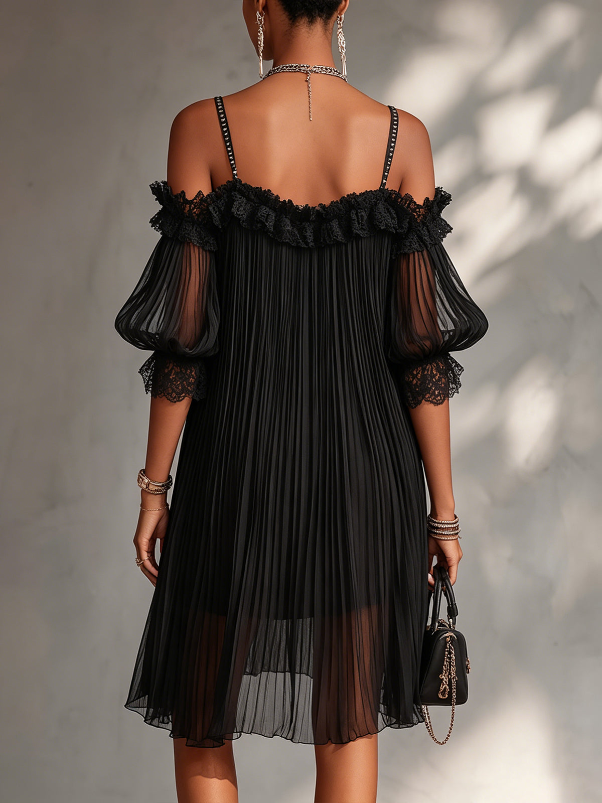 Vittoria off-shoulder chiffon mini dress with lace trim, featuring a flowy silhouette and delicate neckline details.