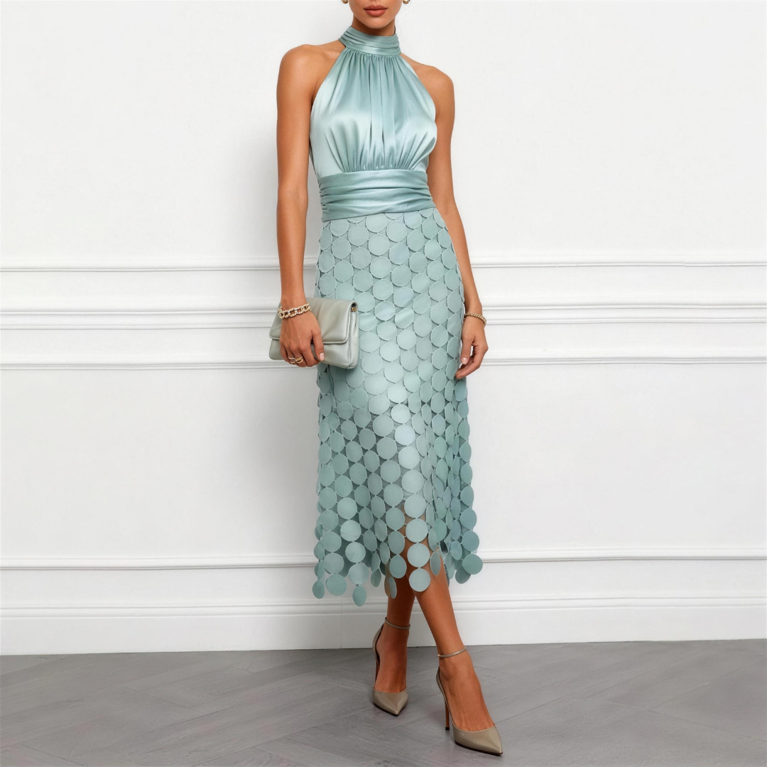 Bennett and Family Celine halter midi dress in lightweight fabric, featuring a fitted bodice and flowing skirt.