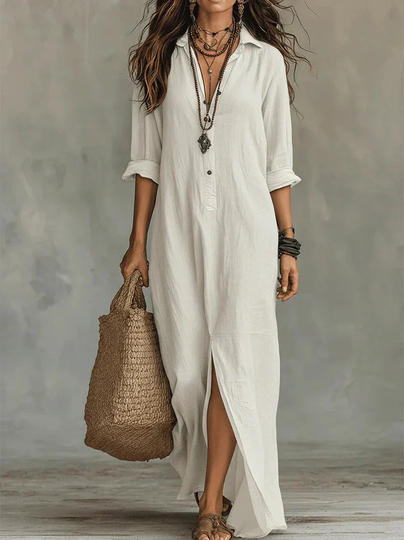 Bennett and Family Sofia Maxi Dress in flowing fabric with floral pattern, featuring a V-neck and sleeveless design.