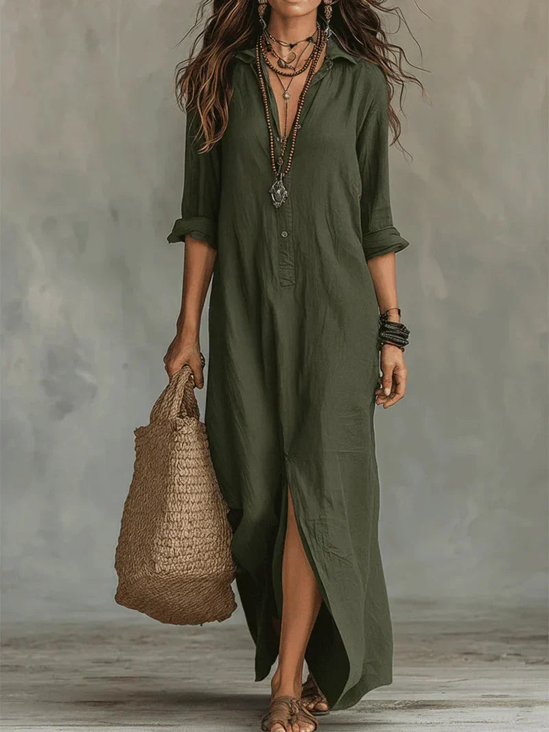 Bennett and Family Sofia Maxi Dress in flowing fabric with a fitted bodice and full skirt, displayed on a hanger.