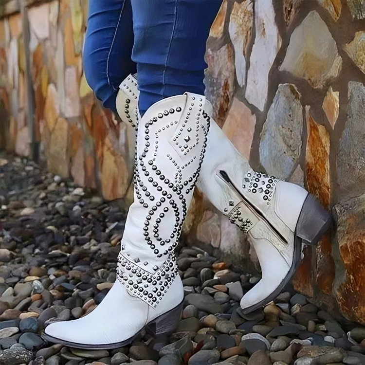 Western knee-high boots by Bennett and Family, featuring brown leather with decorative stitching and pointed toes.