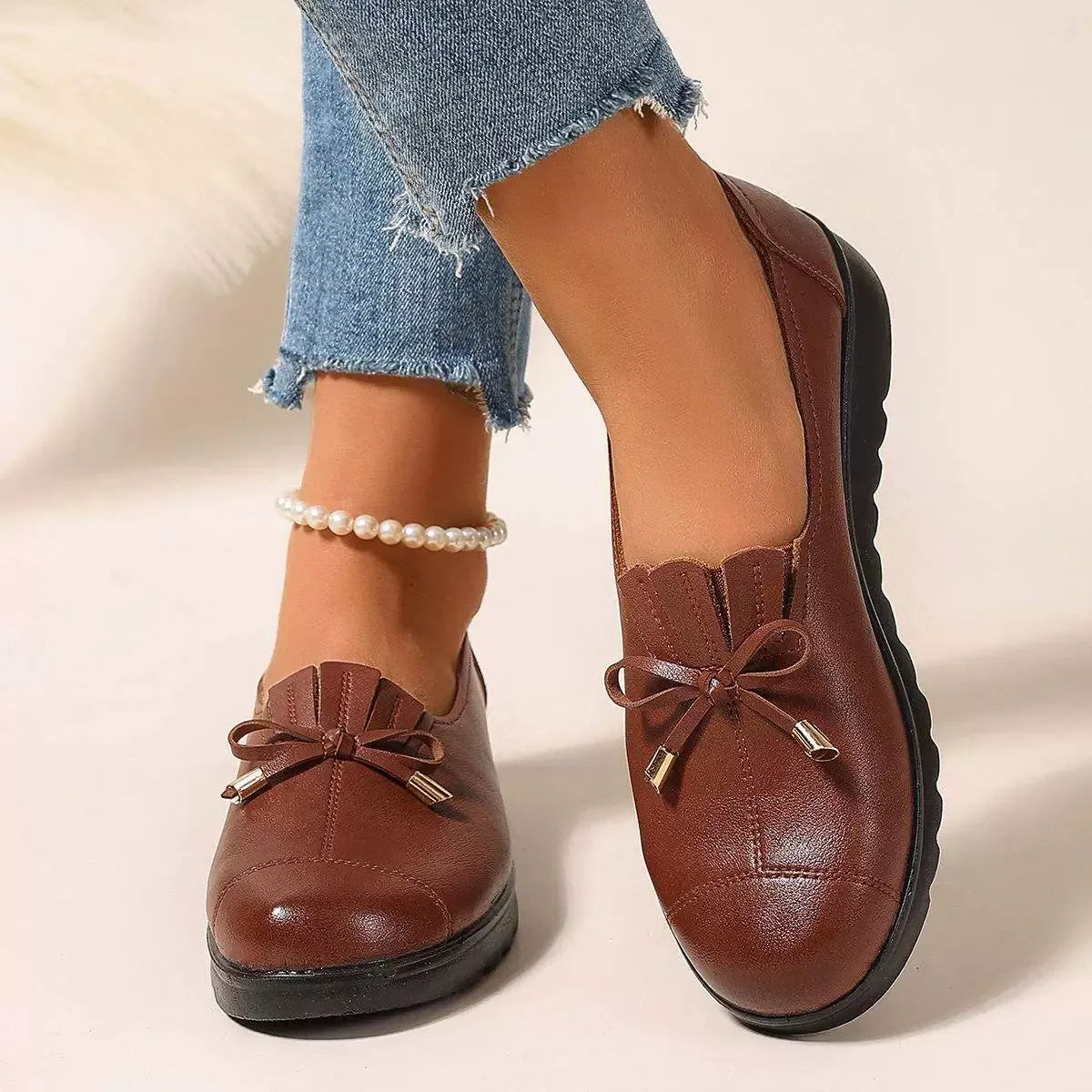 Bennett and Family Catherine Elegant Comfort loafers in neutral color, featuring a sleek slip-on design and comfortable sole.