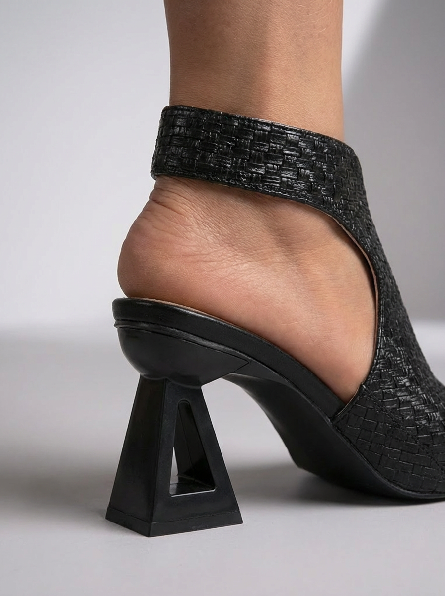 Elegant woven heel shoes by Bennett and Family, featuring a stylish design with a sleek heel and woven textured upper.
