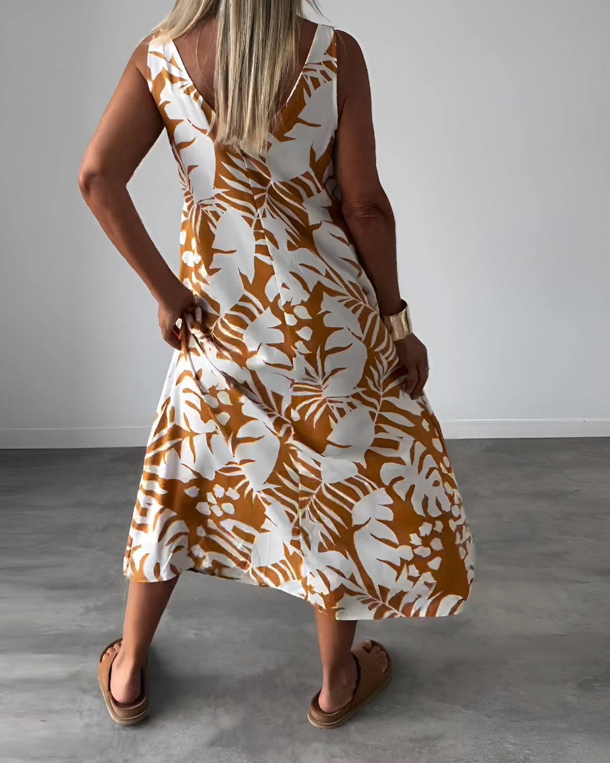 Elegant strapless dress by The Rowan Daughters, Audrey style, featuring a fitted bodice and flowing skirt in a sophisticated design.