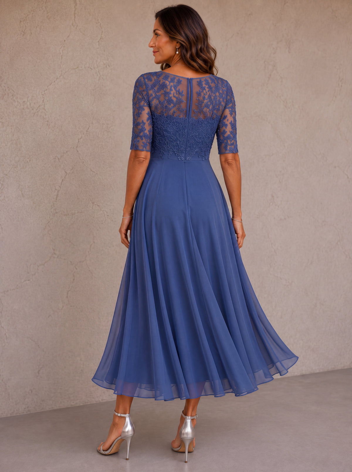 Elegant Abella lace and chiffon maxi dress by Bennett and Family, featuring intricate lace details and flowing chiffon fabric.