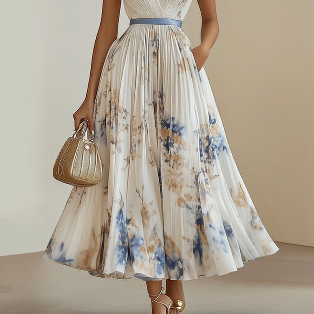 Elara dress with soft V-neck by The Rowan Daughters, showcasing a flowy fabric and elegant fit in a stylish silhouette.