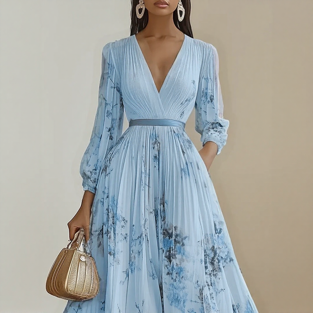 Elara dress with soft V-neck by The Rowan Daughters, featuring a flowing fabric and elegant design perfect for casual or formal wear.