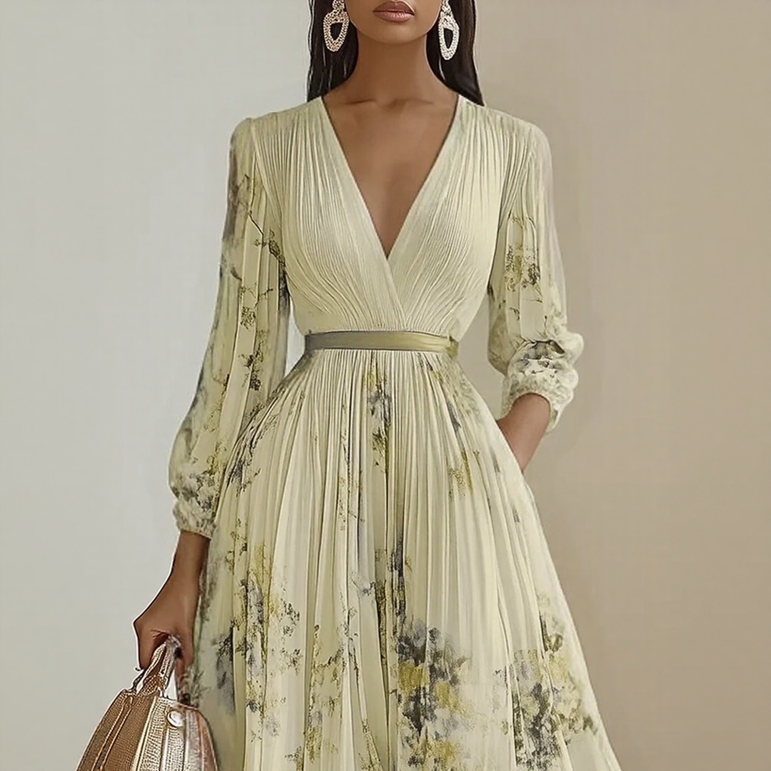 Elara dress by The Rowan Daughters featuring a soft V-neck, lightweight fabric, and a flowing silhouette.