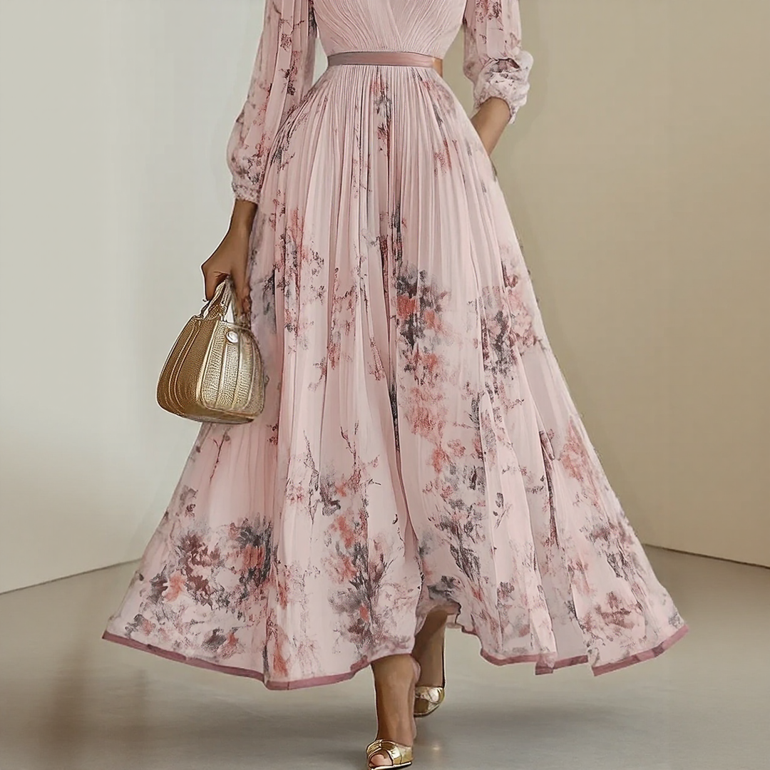 The Rowan Daughters Elara dress with a soft V-neck, featuring flowing fabric and elegant design, suitable for casual or semi-formal wear.