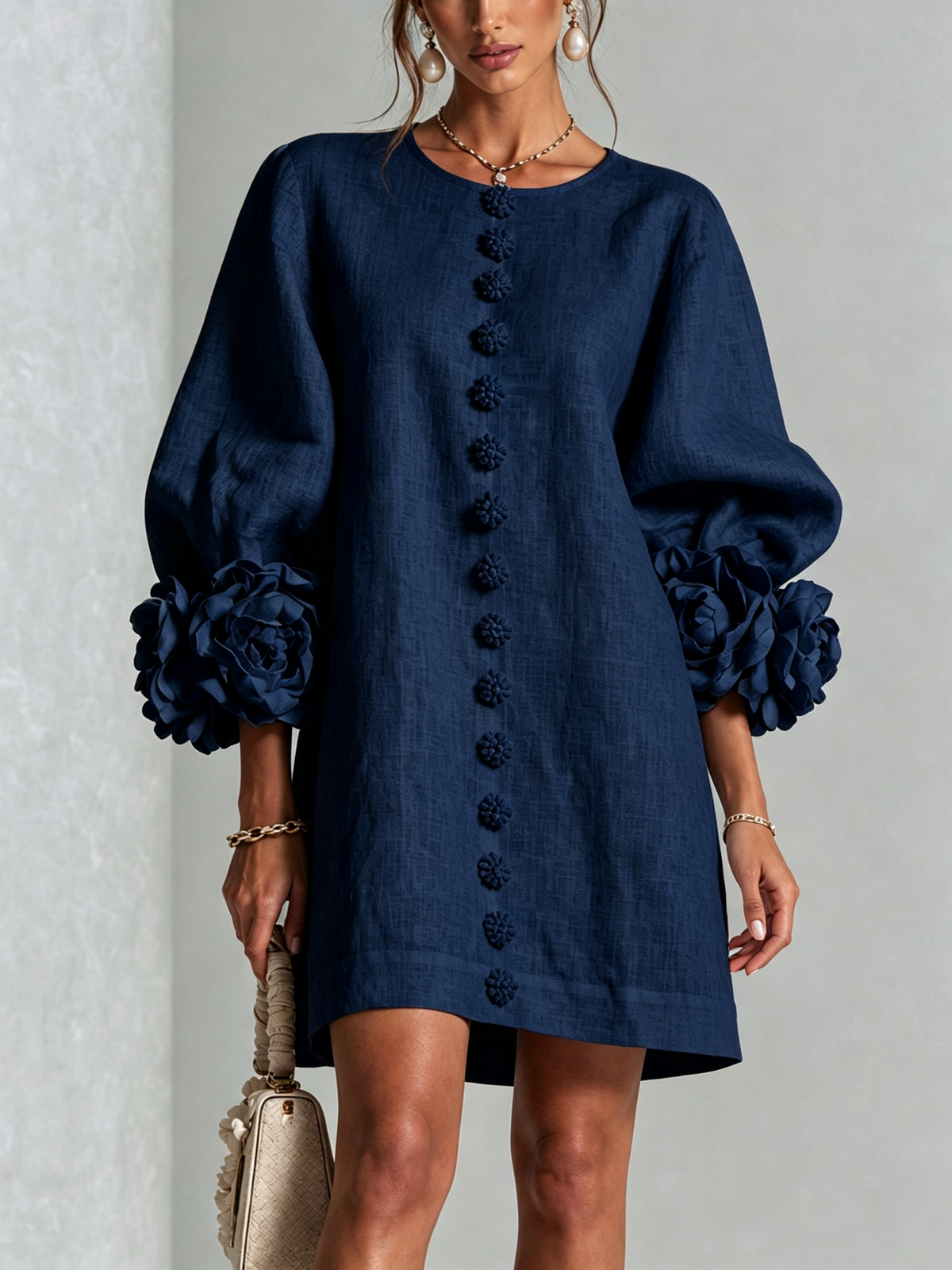 Navy Susanna Mini Dress by Bennett And Family featuring a fitted silhouette and stylish design, shown on a hanger.