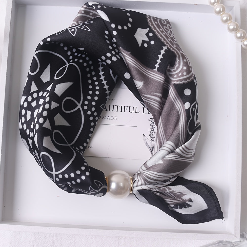 Elodie scarf by Bennett and Family, featuring soft fabric with delicate floral pattern in pastel colors.