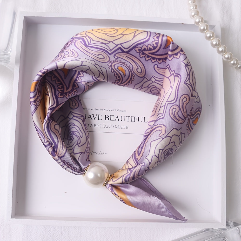 Elodie Bennett and Family scarf featuring soft fabric with floral pattern, draped on a white background.
