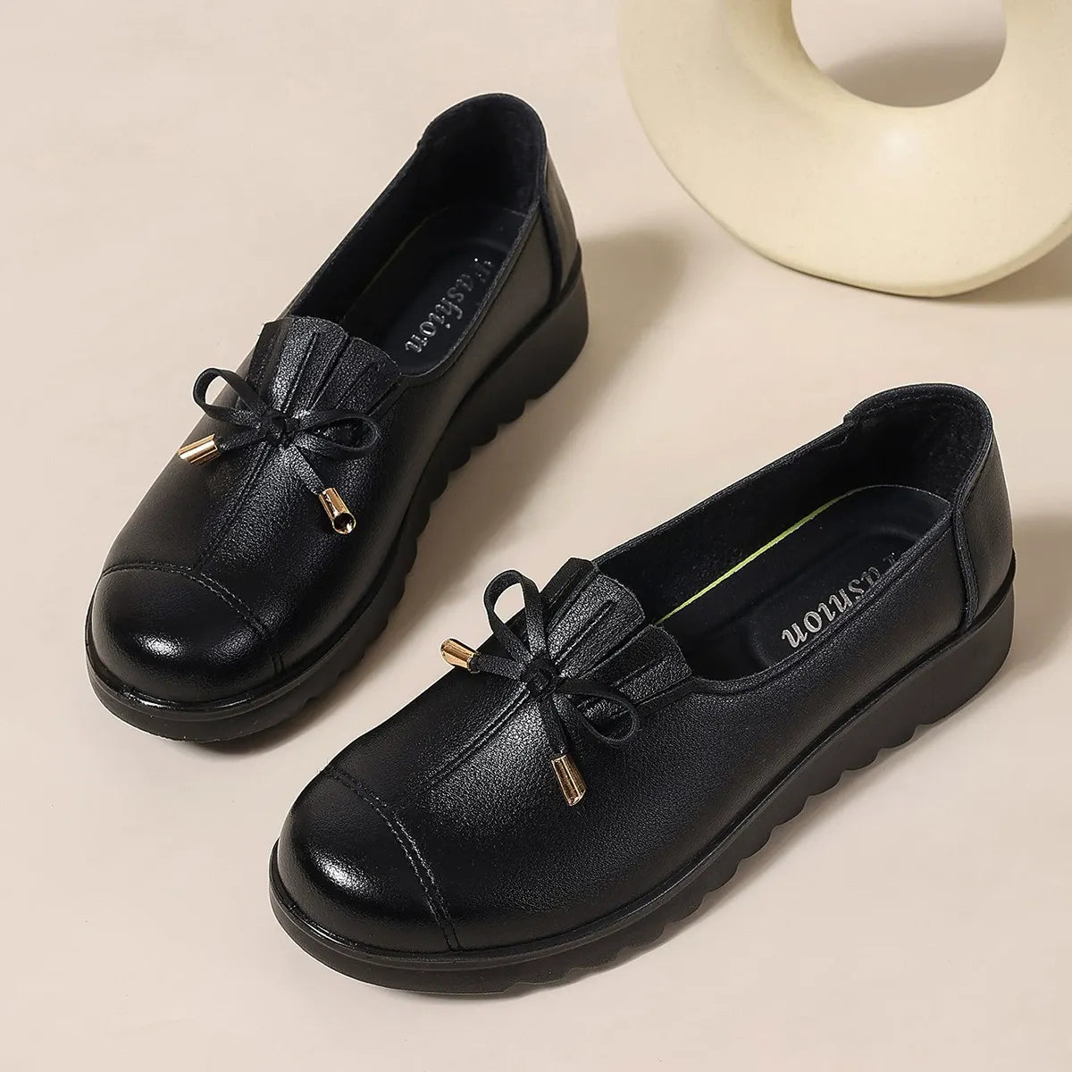 Bennett and Family Catherine Elegant Comfort Loafers in neutral color, showing a close-up of the stylish, comfortable slip-on footwear.