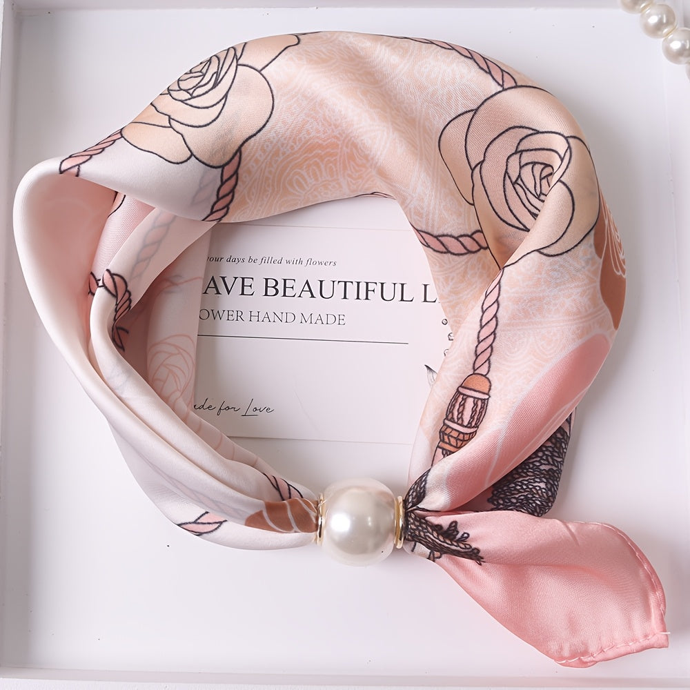 Elodie scarf by Bennett And Family featuring soft, colorful fabric with intricate patterns, displayed folded on a neutral background.