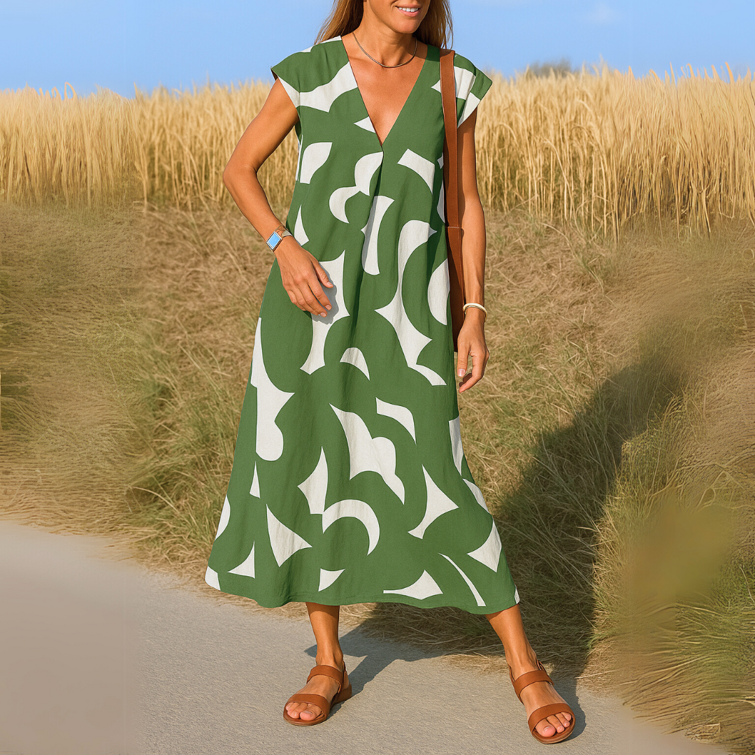 Lightweight Valérie V-neck dress by The Rowan Daughters, shown in a soft fabric with a flowing silhouette and subtle neckline.