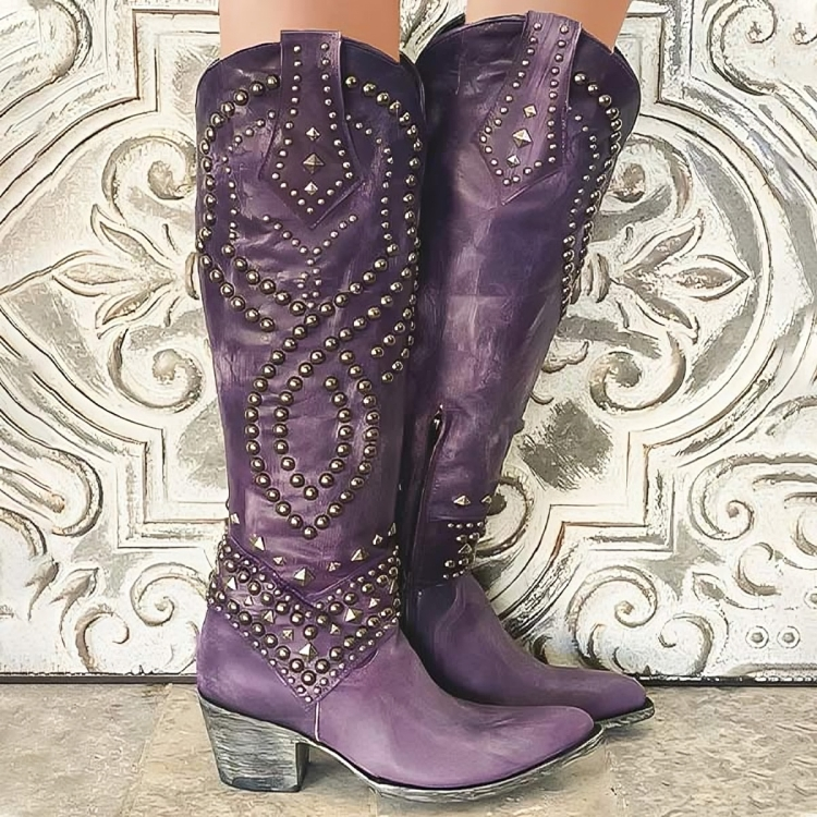 Western knee-high boots by Bennett and Family, featuring leather material and pointed toes, styled with a stacked heel.