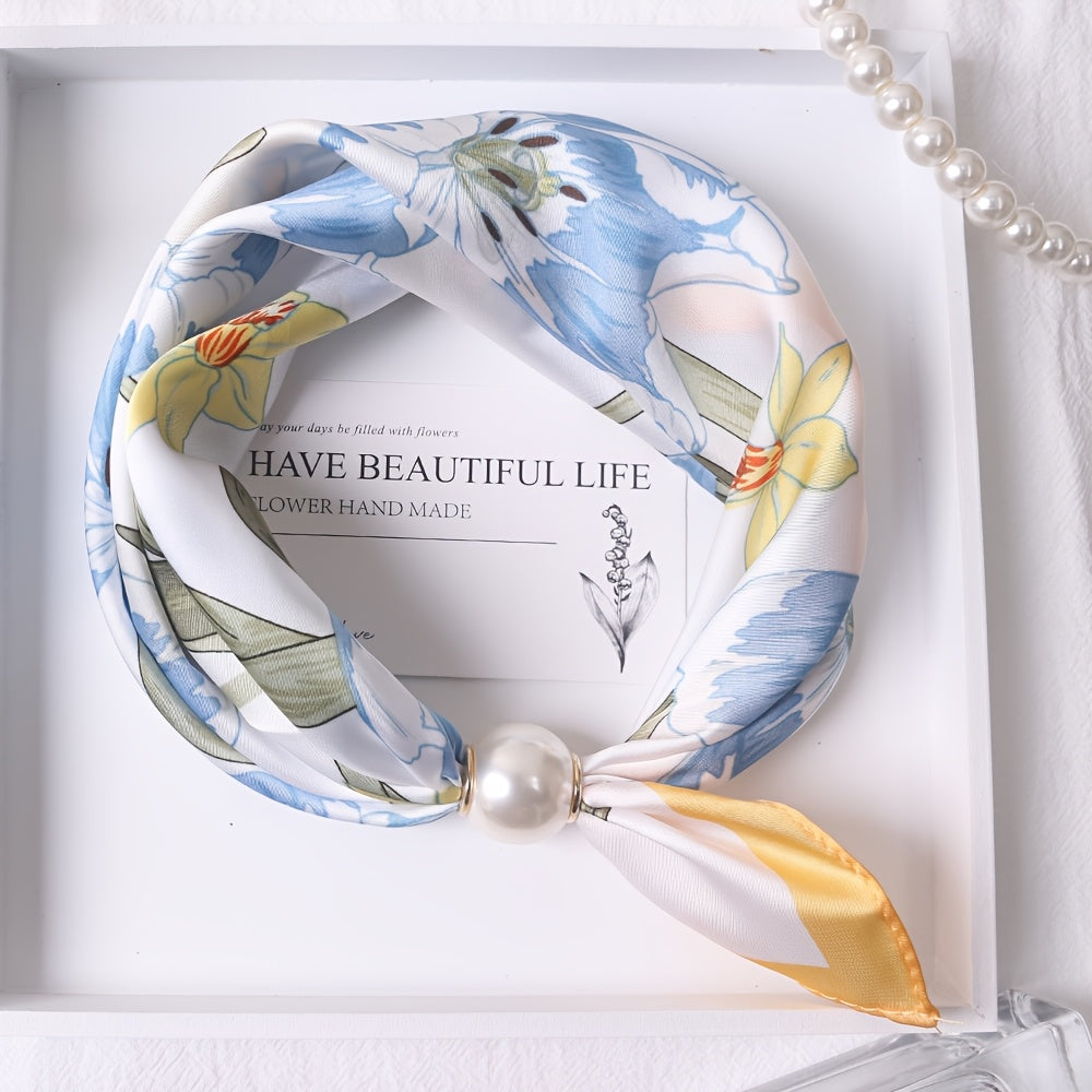 Elodie scarf by Bennett and Family featuring soft fabric with a stylish pattern, draped over a neutral background.