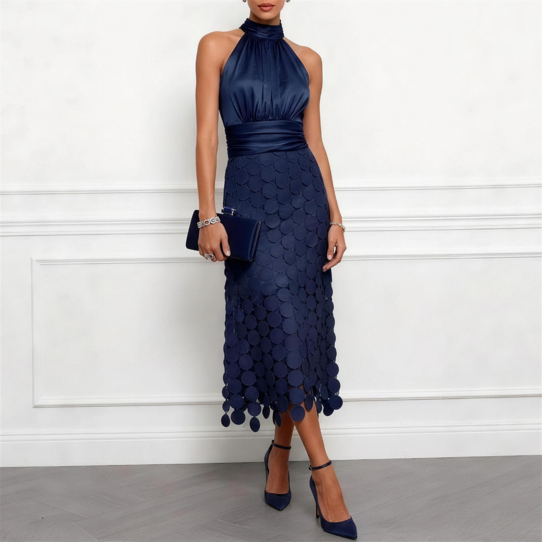 Bennett and Family Celine halter midi dress in lightweight fabric, featuring a fitted bodice and flowing skirt, stylish and elegant.