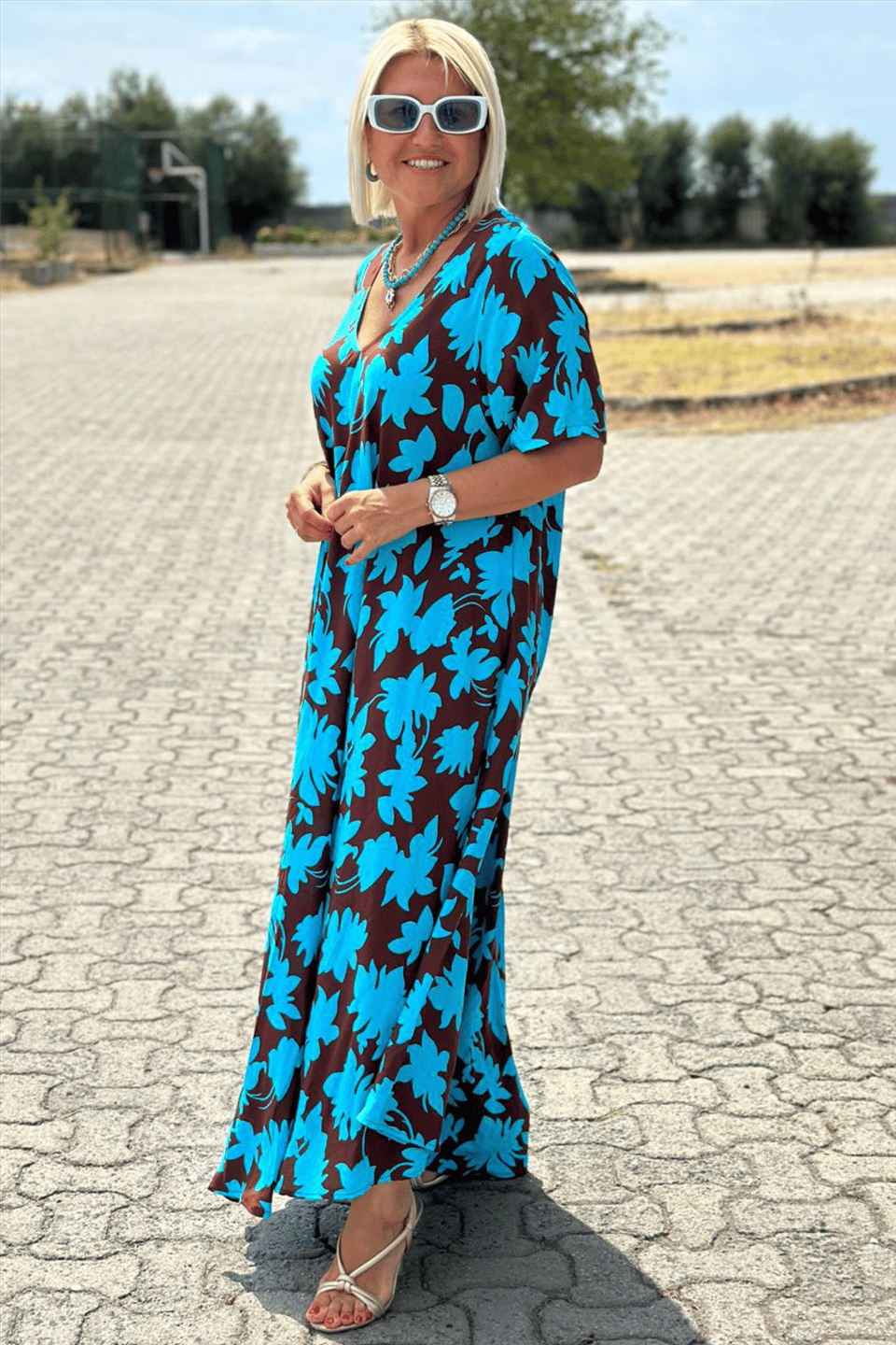 Elegant Patricia dress by The Rowan Daughters featuring flattering tummy coverage and stylish design.
