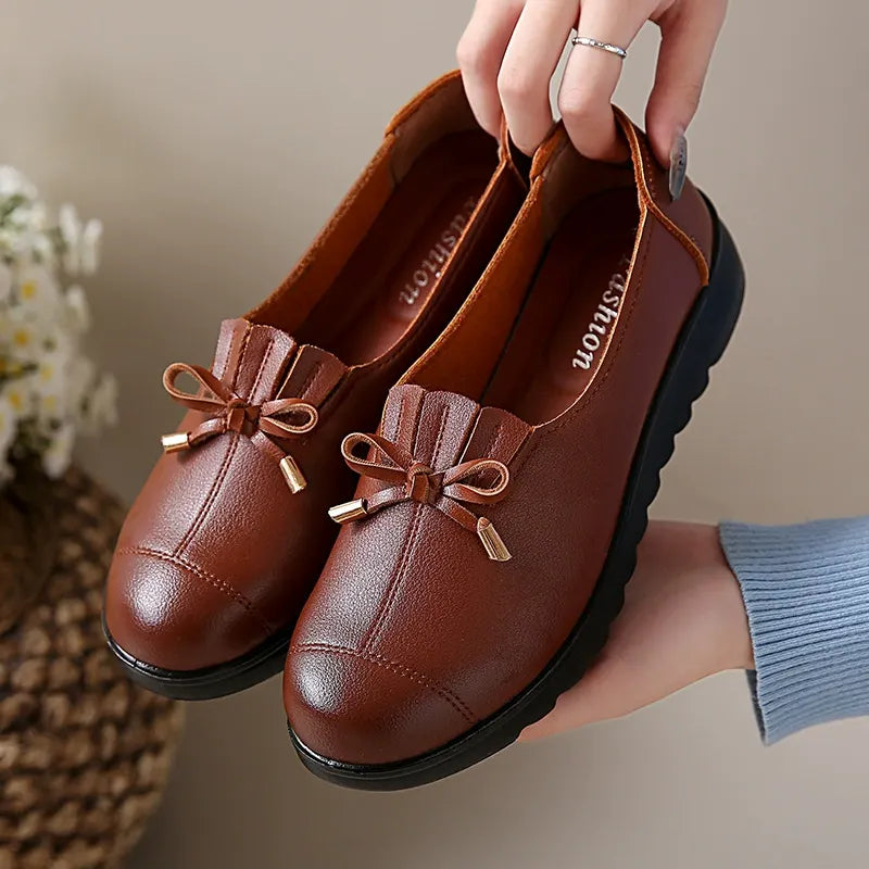 Bennett And Family Catherine elegant comfort loafers in neutral color, showcasing their sleek design and soft material.