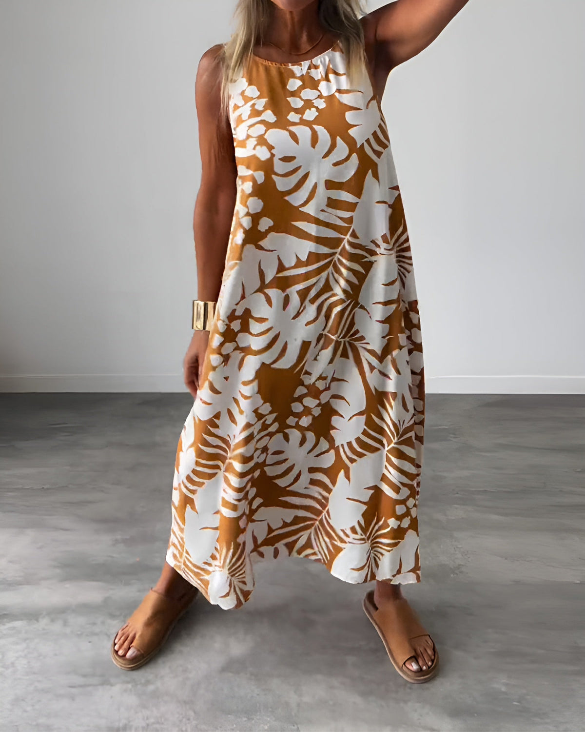 Elegant strapless dress from The Rowan Daughters Audrey collection, featuring a fitted silhouette and floral embroidery.