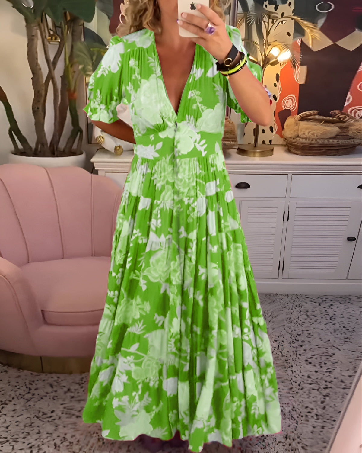 Carine floral print dress with V-neck and pockets by The Rowan Daughters, featuring a colorful, flowy design.