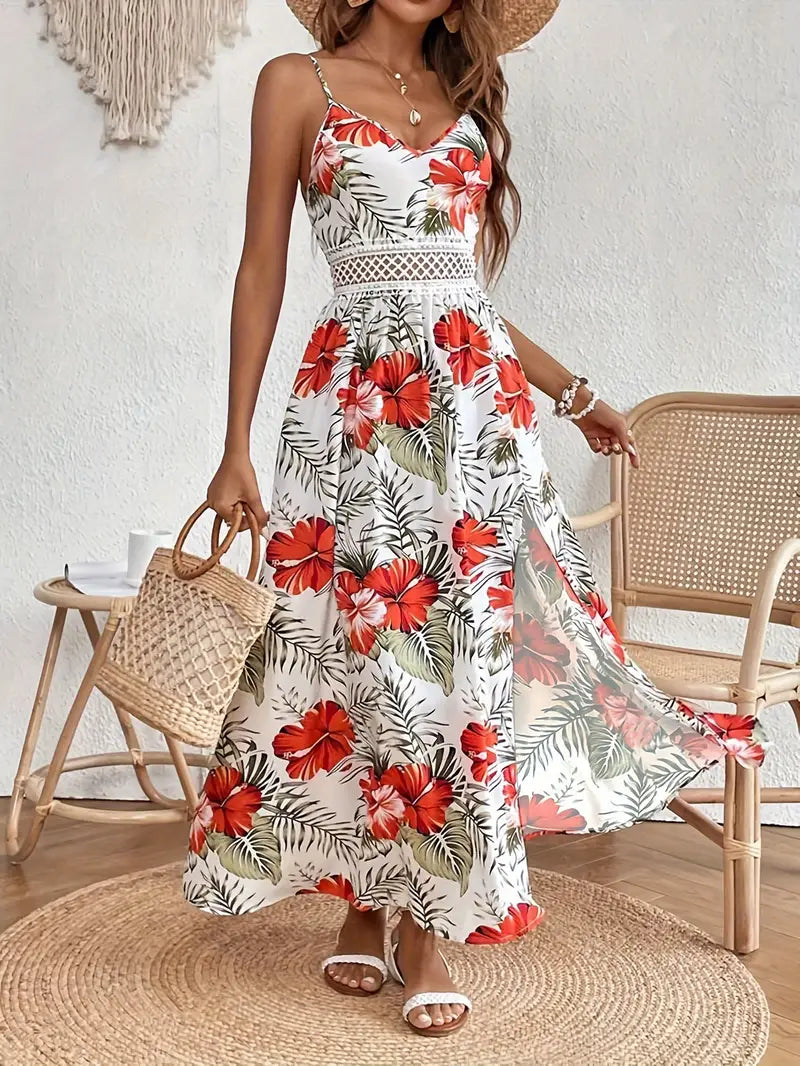 Ingrid summer dress by The Rowan Daughters featuring a floral print, flowing fabric, and sleeveless design perfect for warm weather.