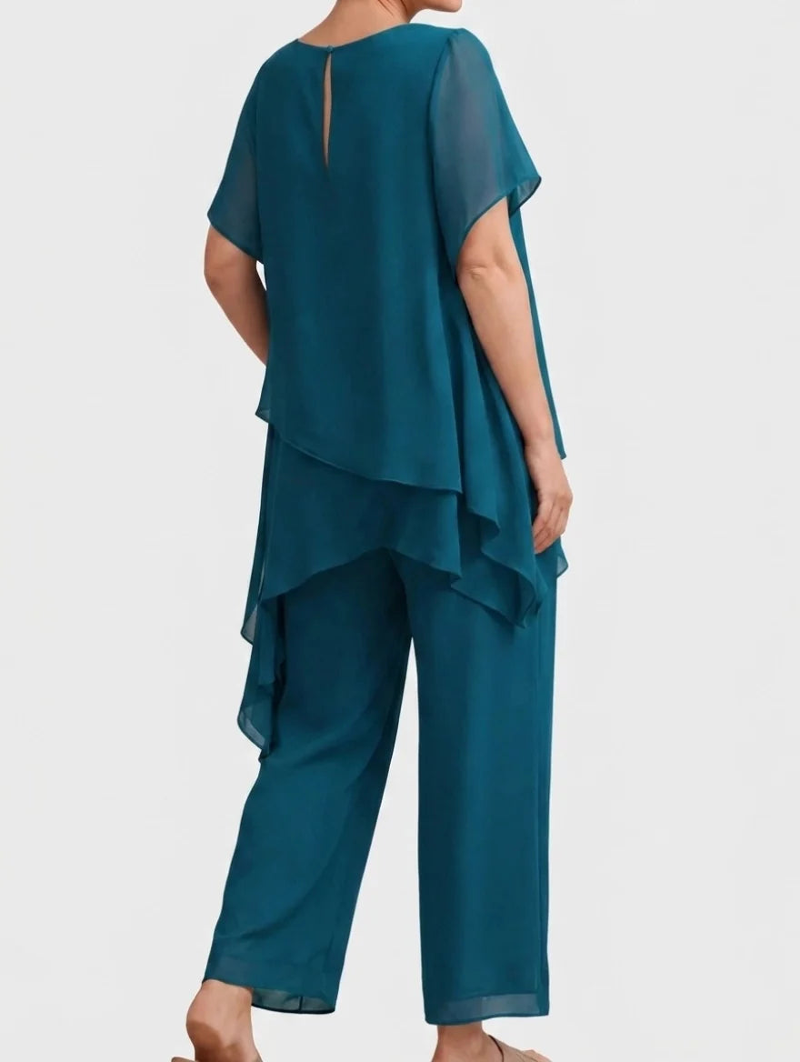 Bennett and Family Completo Aurora Palazzo in flowing fabric, featuring a wide-leg design and elegant pattern, worn by a model.