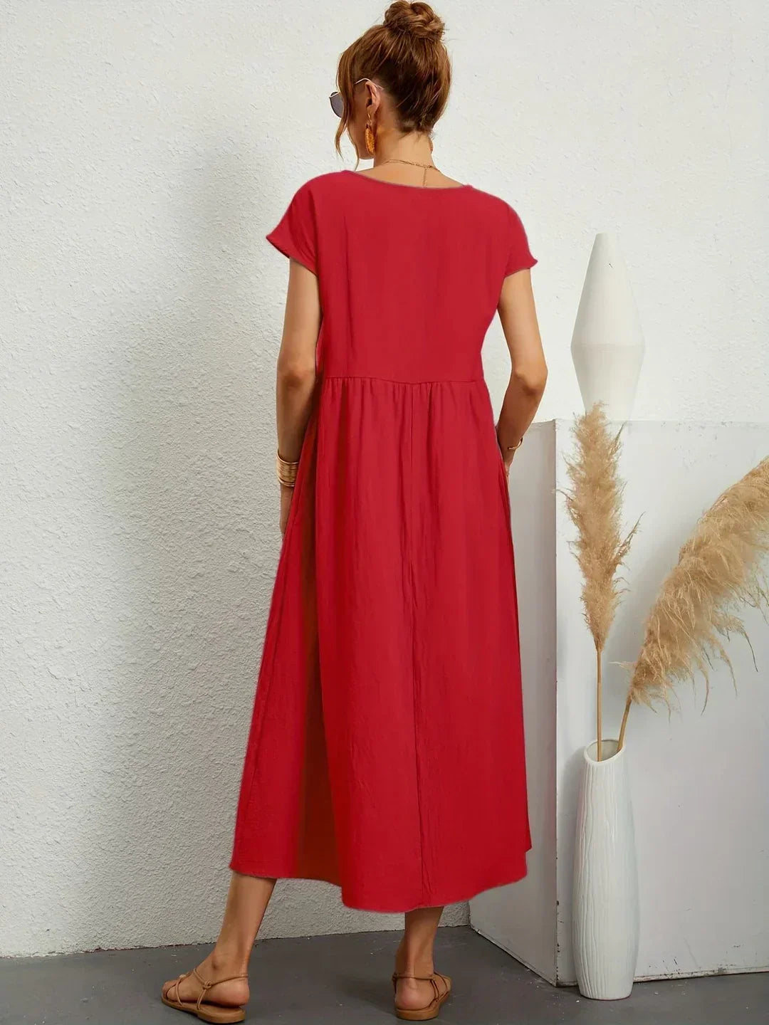 Gabrielle flowing midi dress by Bennett and Family, shown in a lightweight fabric with a relaxed fit and elegant design.