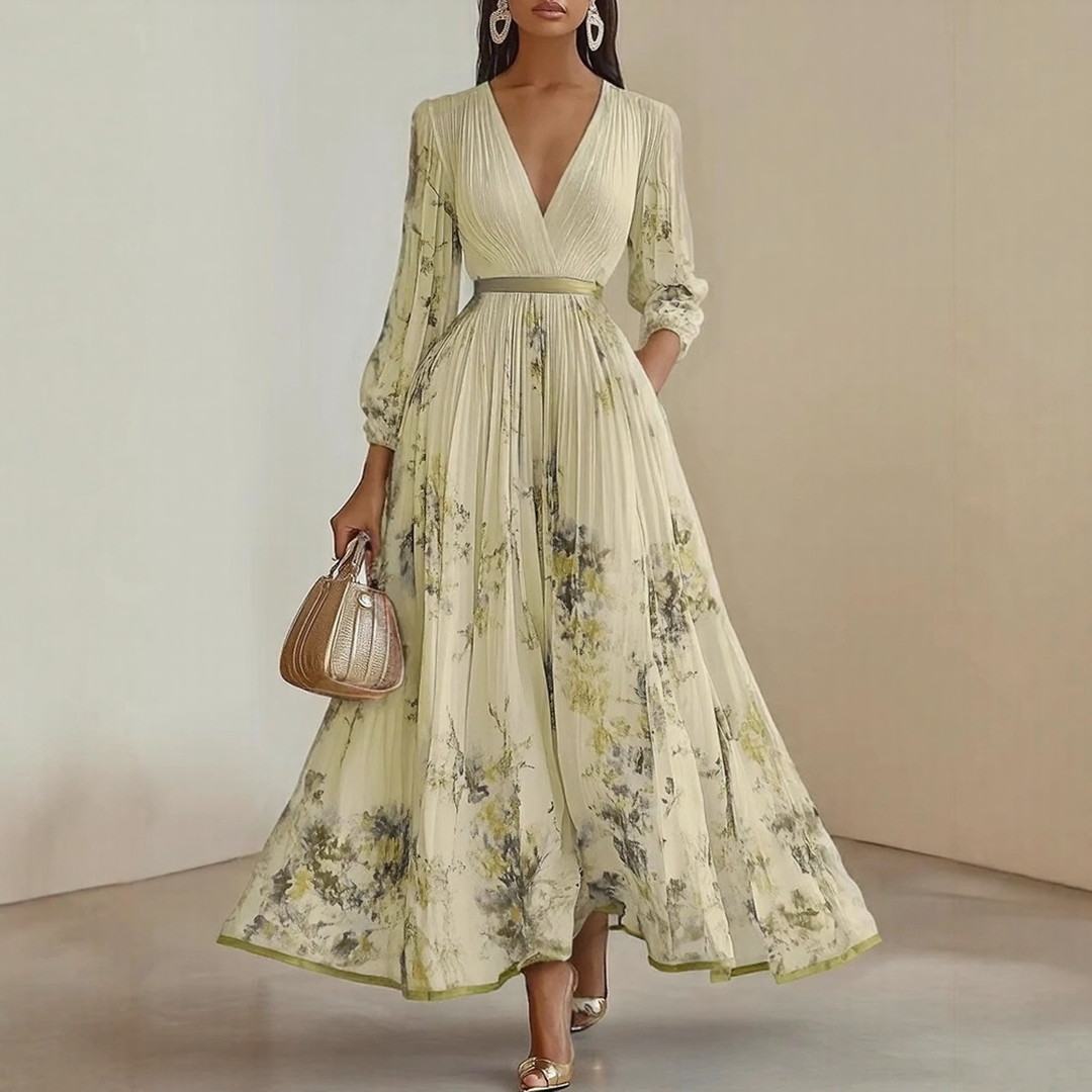 Elara dress with soft V-neck by The Rowan Daughters, featuring a flowing fabric and elegant design, shown on a model.