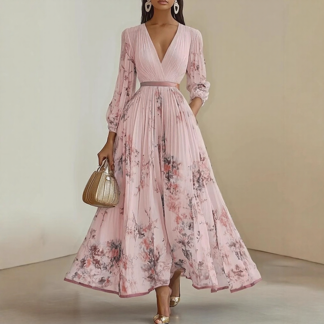Elara dress with soft V-neck by The Rowan Daughters, featuring a flowing fabric and elegant design.