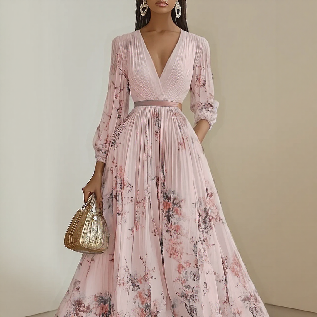 The Rowan Daughters Elara dress featuring a soft V-neck, shown in a stylish, flowing fabric perfect for elegant daytime wear.