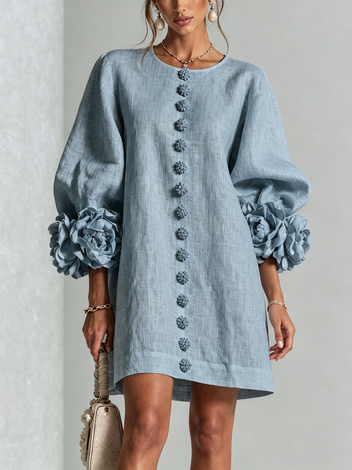 Susanna Mini Dress by Bennett And Family in dusty blue, featuring a stylish, lightweight dress with a fitted waist and short sleeves.