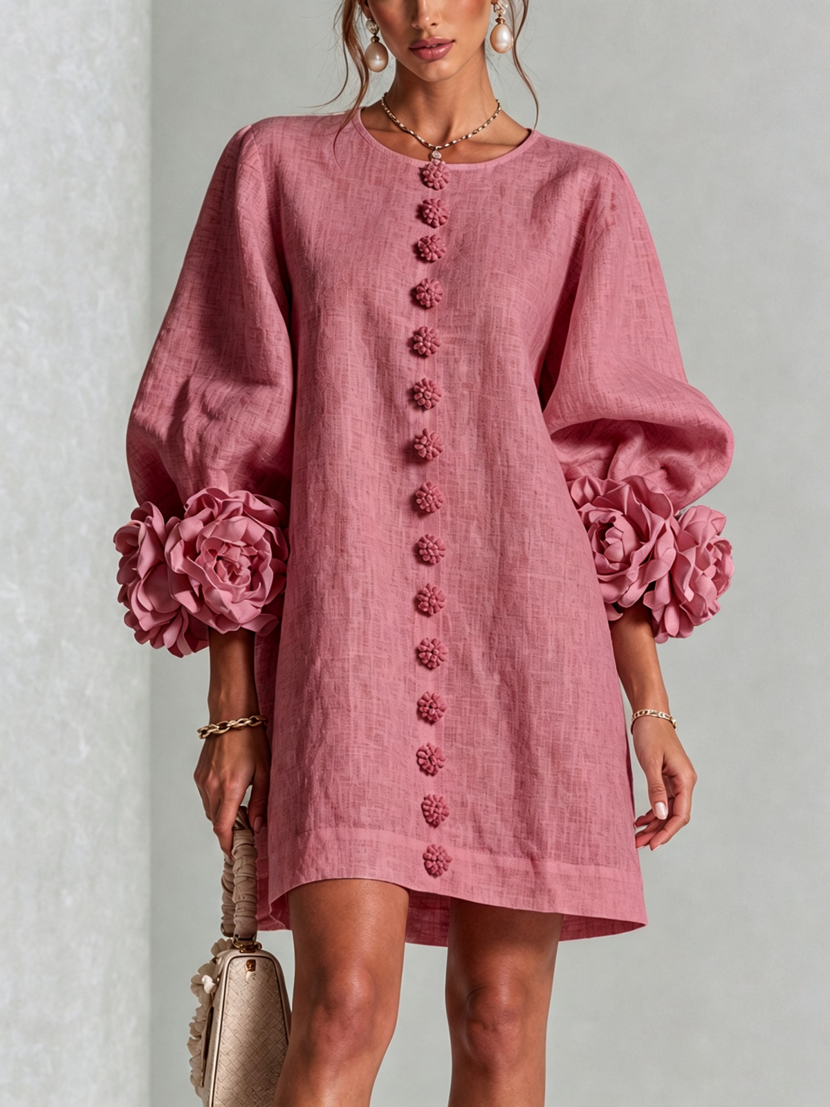 Susanna Mini Dress by Bennett And Family in pink with floral pattern, sleeveless design, and fitted waist on model.