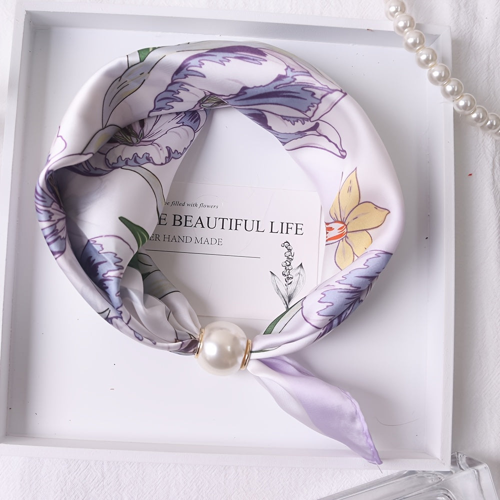 Elodie scarf by Bennett and Family featuring soft, lightweight fabric with a stylish pattern, draped elegantly in the image.
